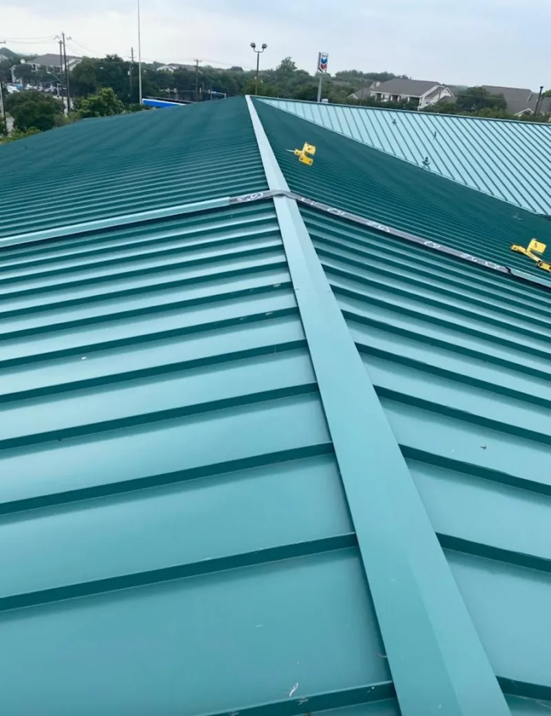 Green commercial metal roof ridge and valley for Metal Roof Repair in Plains