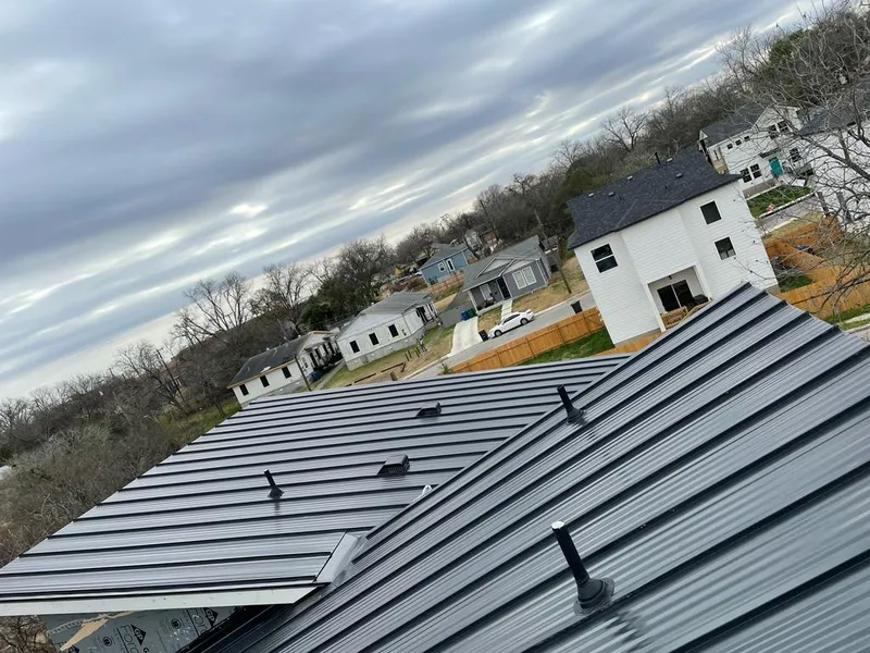 Standing seam metal roof panels with vents for Skylight Repair in Plains